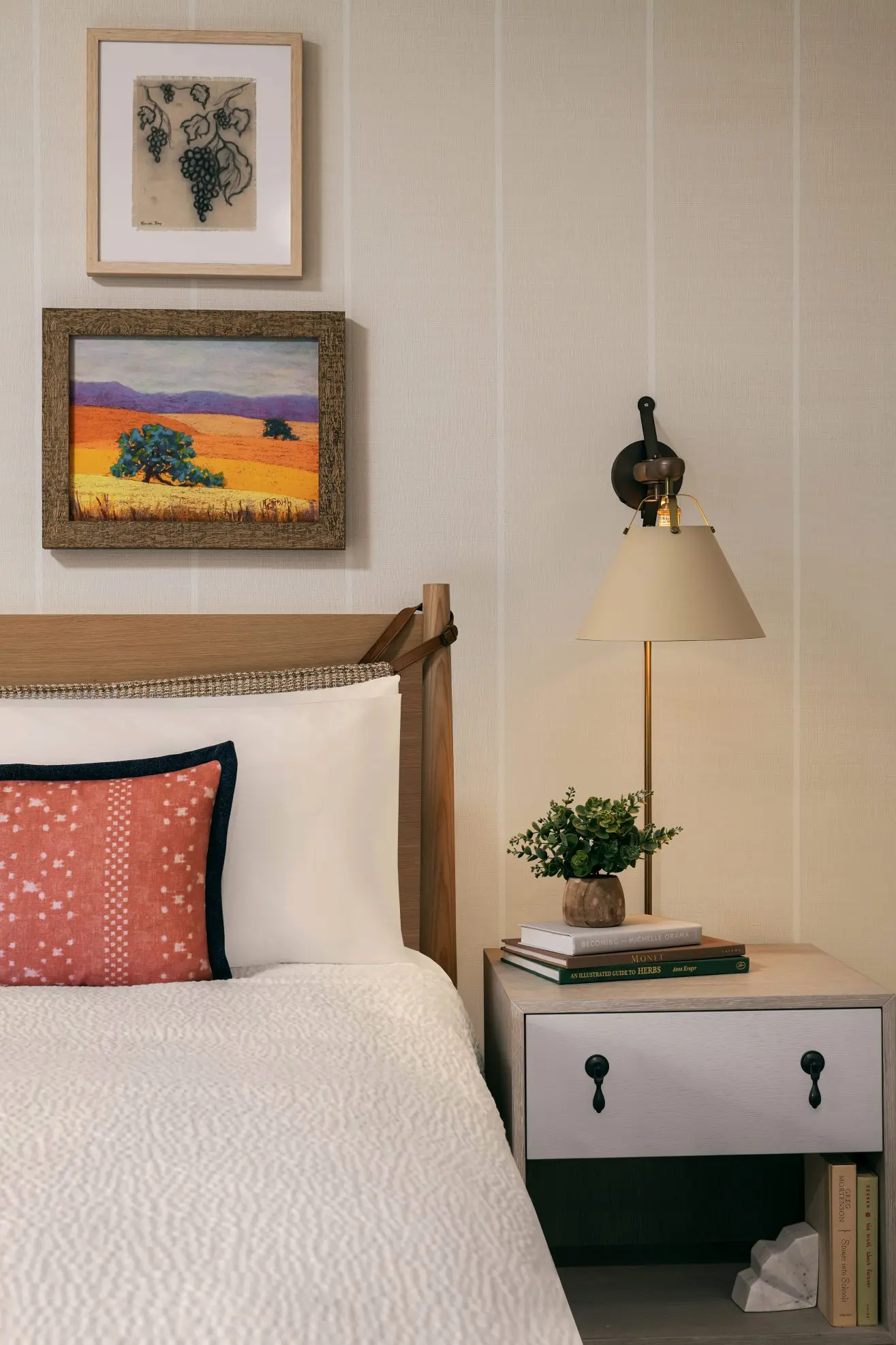 Bed and side table in Park Room at Paso Robles Inn.